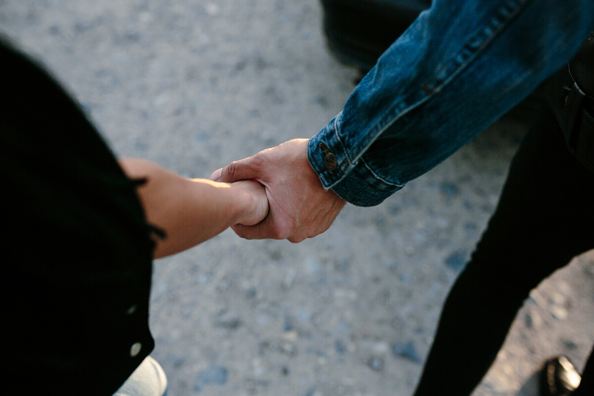 female and male hands together
