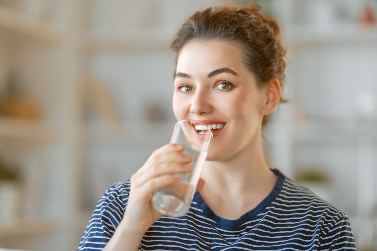 woman drinking pure water